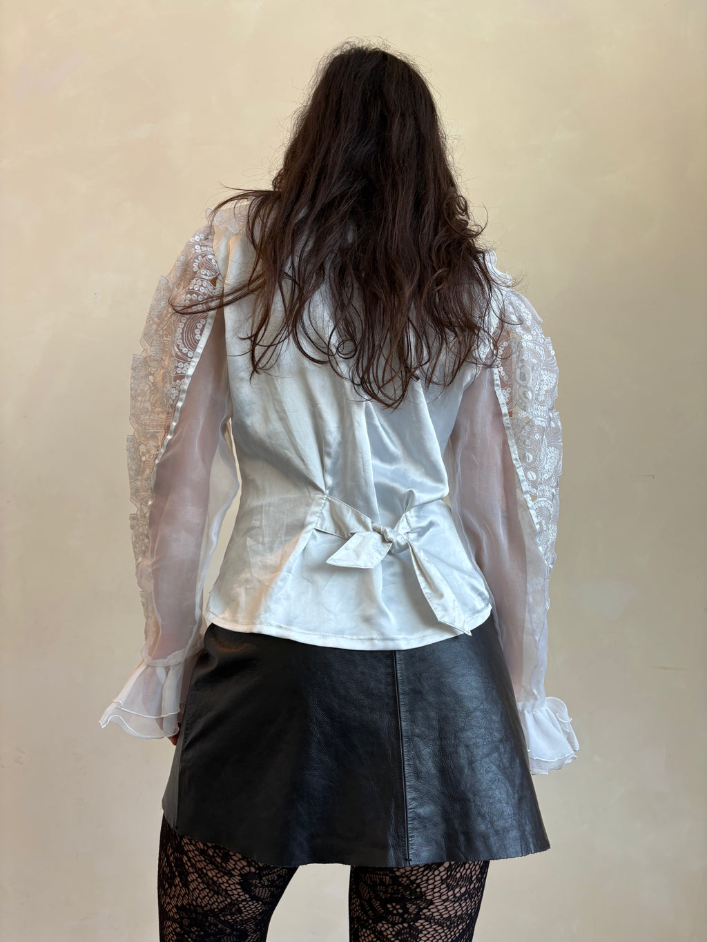 White ruffle shirt