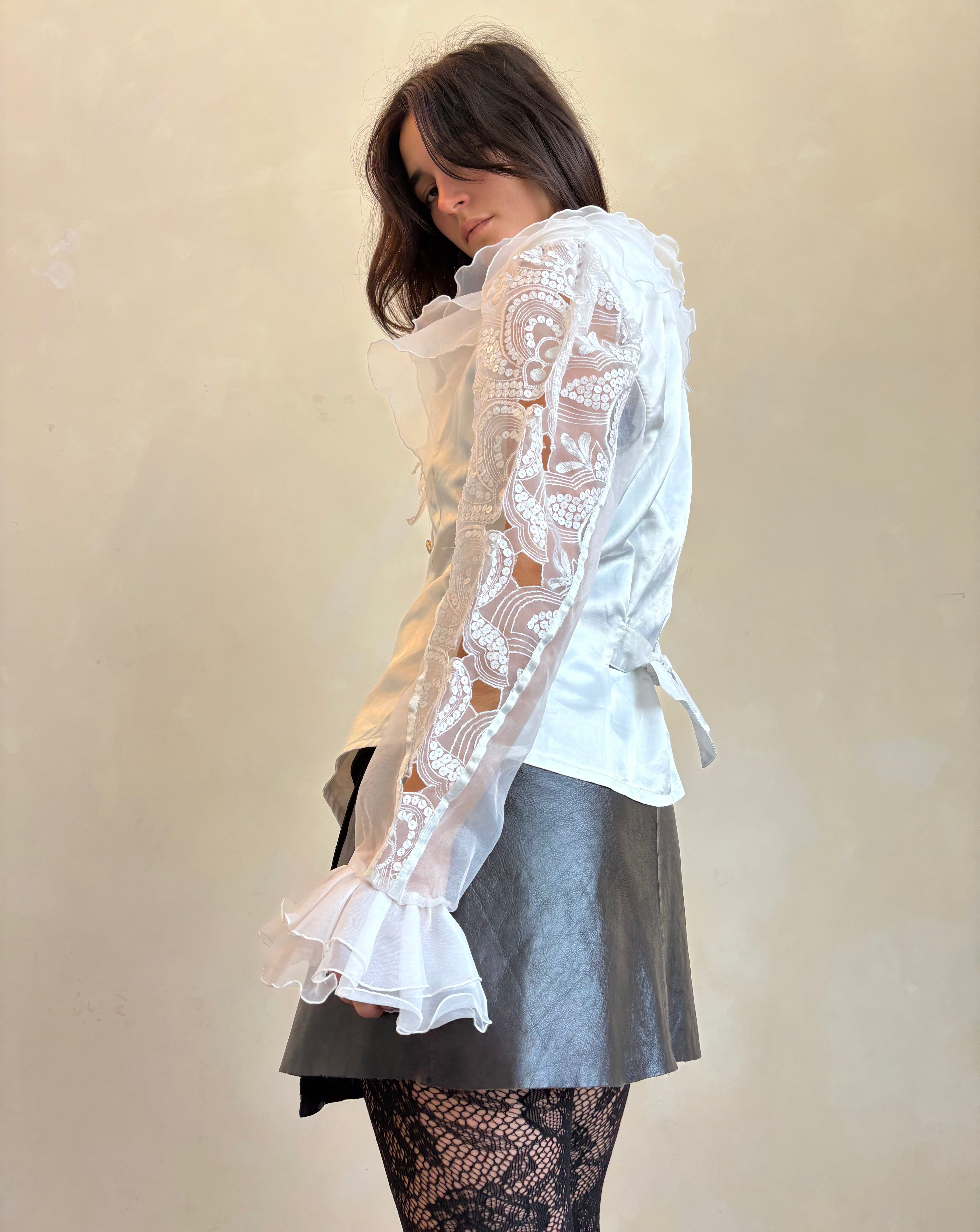White ruffle shirt